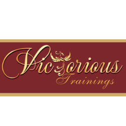 Victorious Trainings in Gold lettering on a marron background. The Phoenix replaces the letter T in Victorious